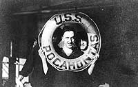 Photo # NH 82952: Crew member poses with a life ring on USS Pocahontas, circa 1918