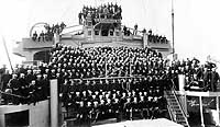 Photo # NH 105772: Officers and crew of USS Aeolus, 1919